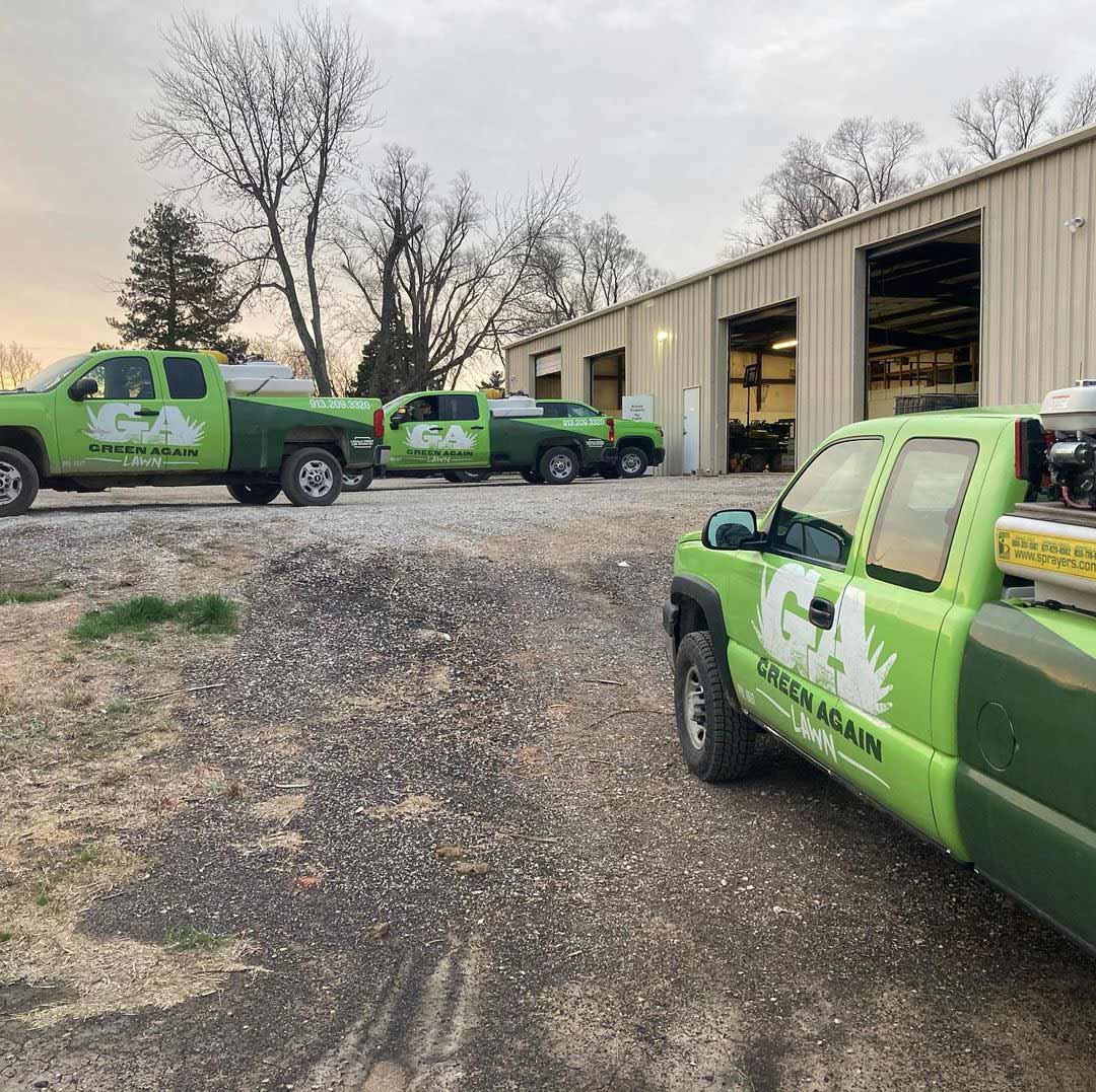 Green Again Lawn trucks prepared for a work day in Spring Hill, KS.