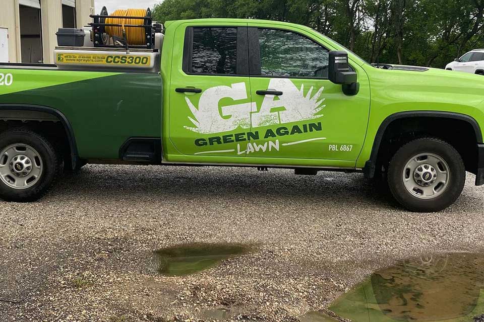 Green Again Lawn work truck in Missouri.